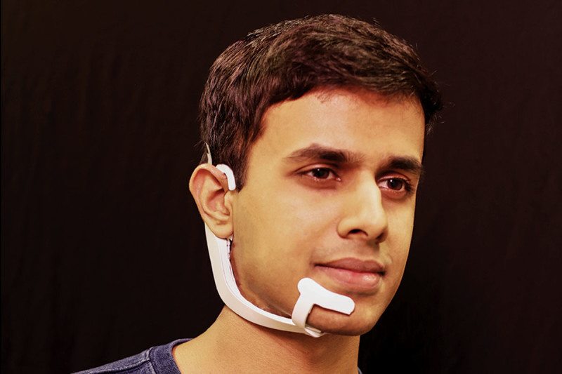 Arnav Kapur models the AlterEgo device he co-created Lorrie LeJeune, MIT